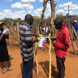 Setting up of a 'Tip-It-Tap', to promote the washing of hands, it is located right outside the garden that is now growing immune boosting herbs.